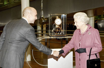 The Queen receives her Great Wheel Skeleton clock from Dent